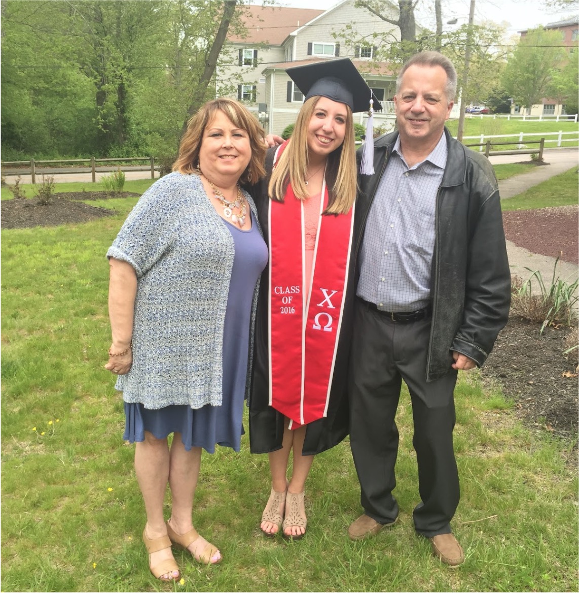 Shannon and her parents celebrate her graduation from URI in 2016.